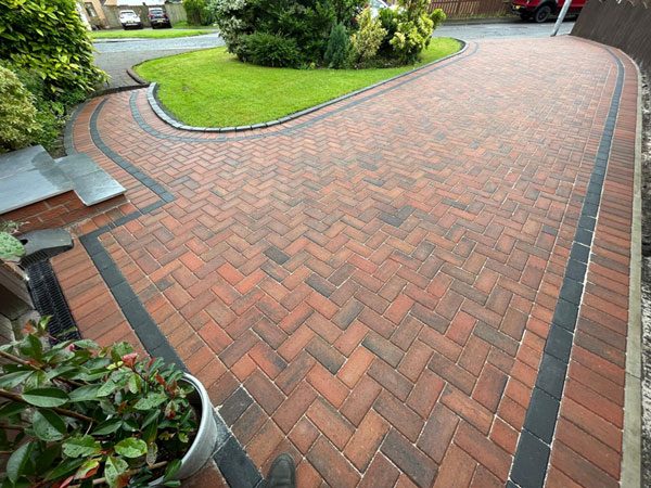 AdsFlair driveway and paving client's completed herringbone block paving installation