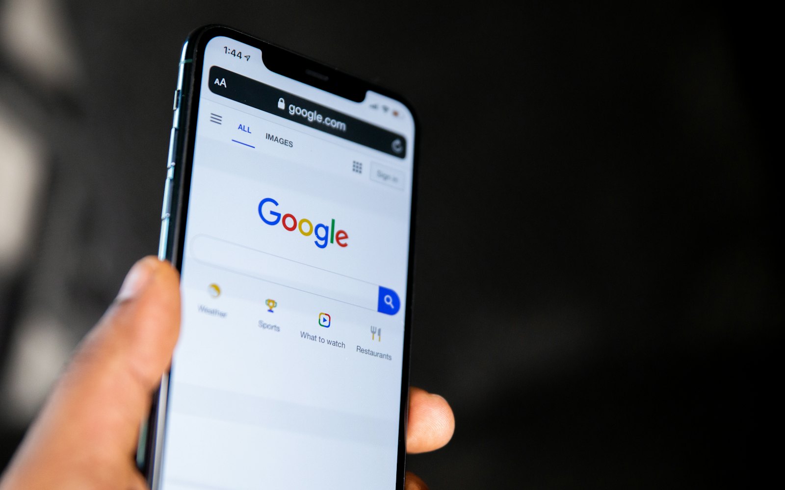 Google search open on a phone, where organic and paid results appear together