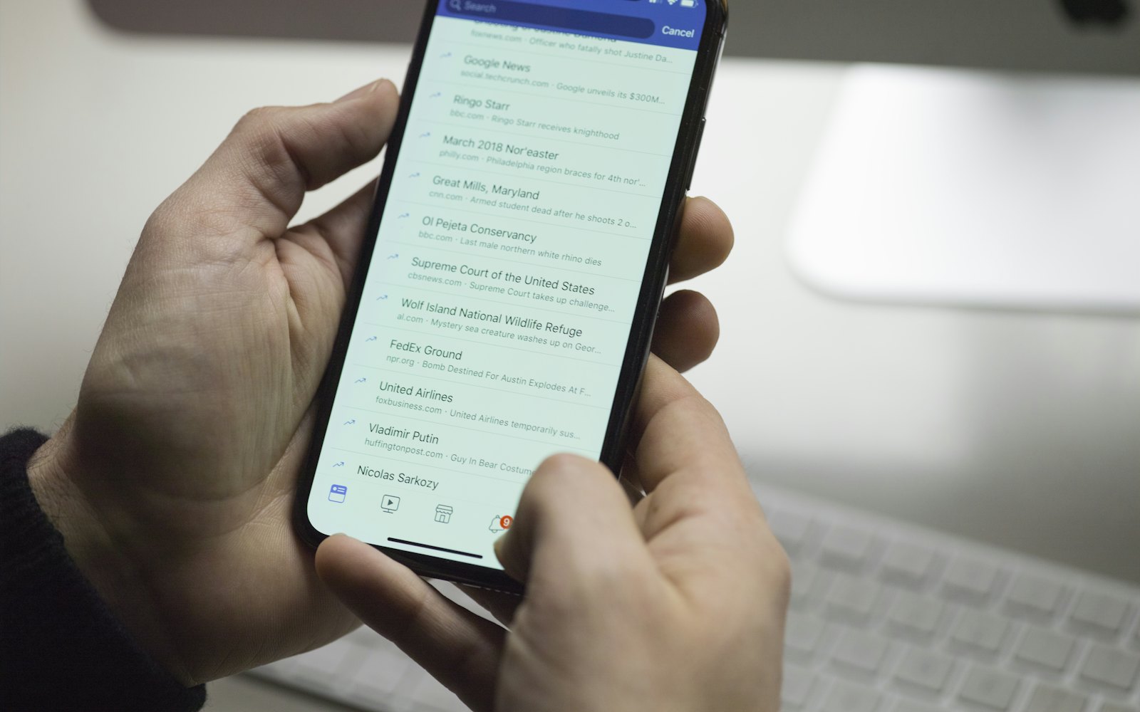 Person filling in a form on a phone